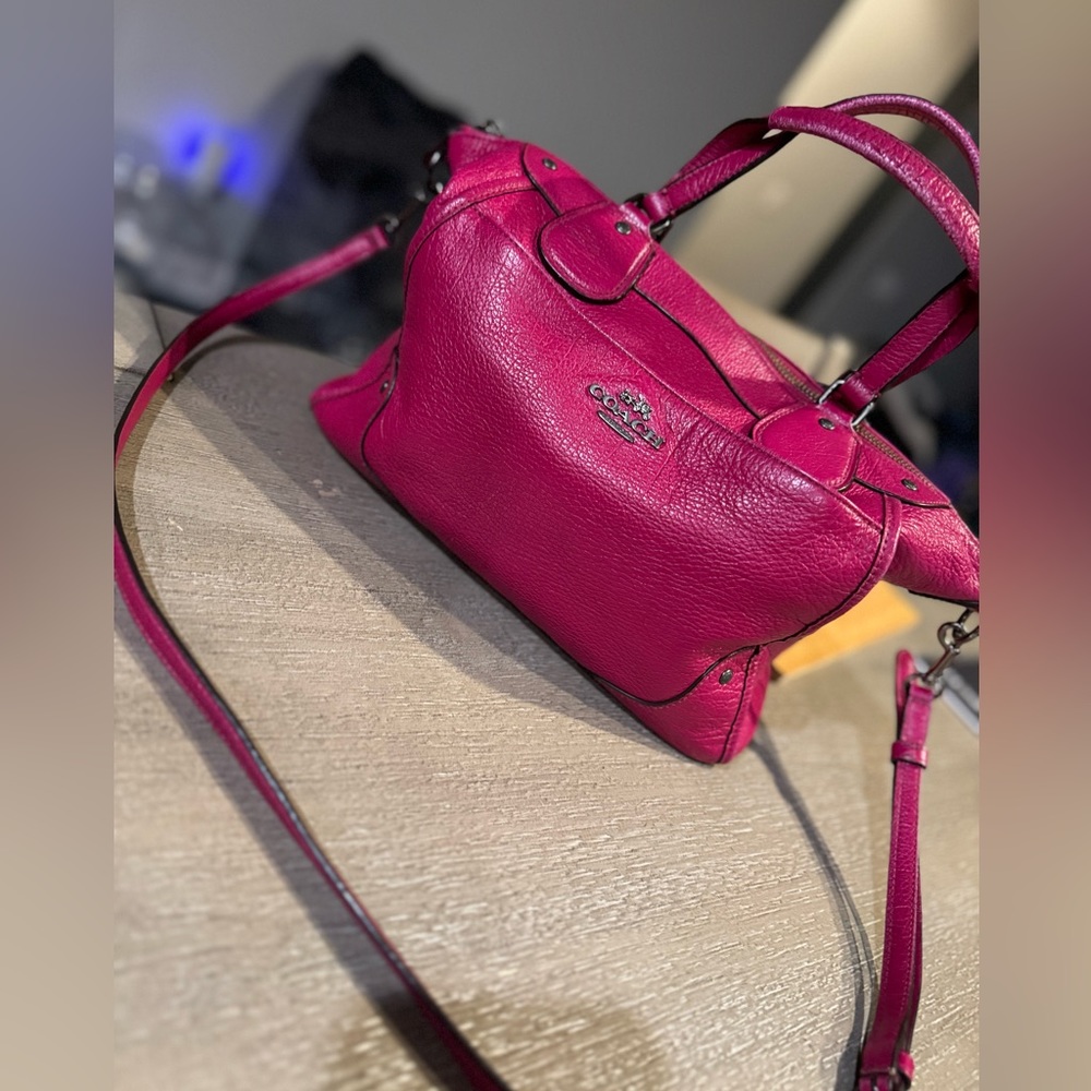 Pink/raspberry colored Authentic Coach Purse good condition. Mickie Satchel